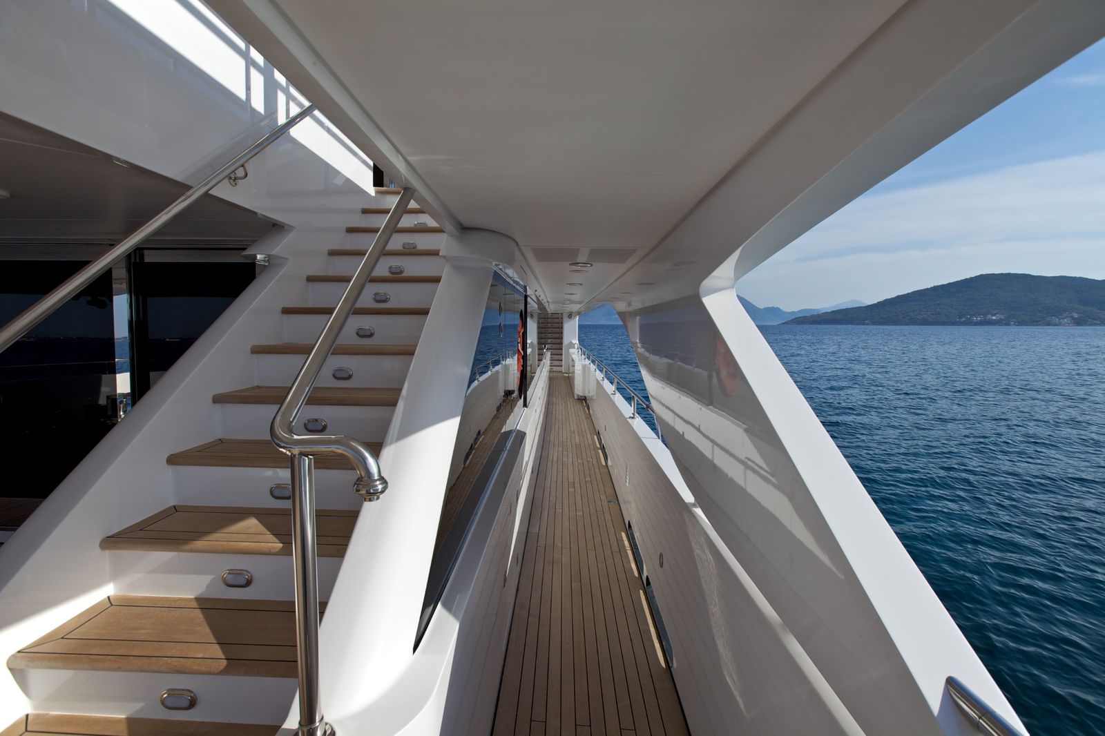 Yacht side deck, teak walkway and staircase
